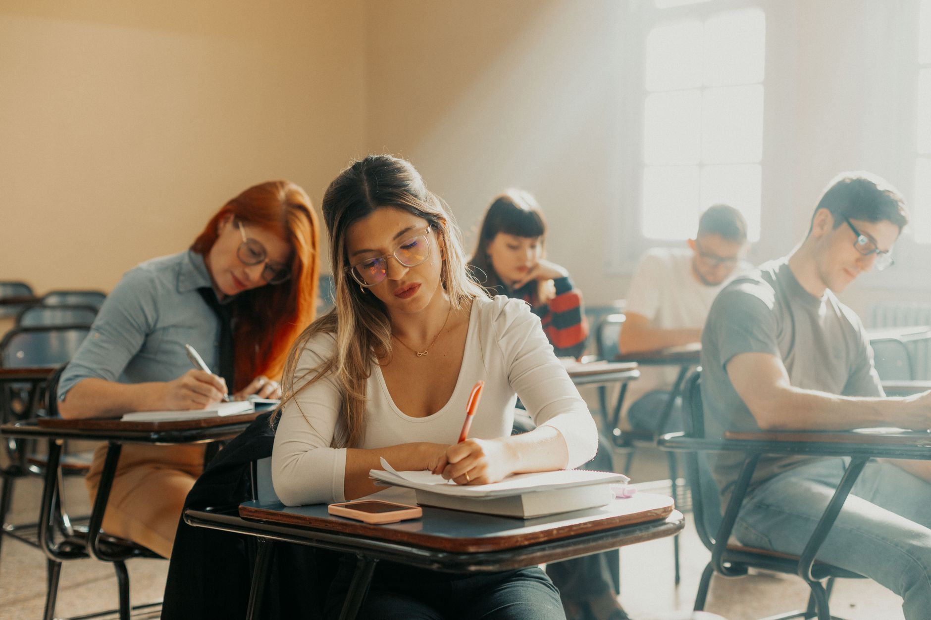 university students studying in classroom